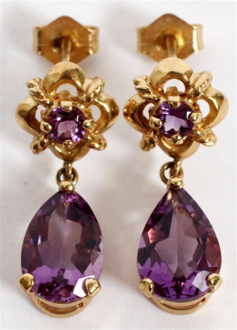 amethyst rolex earrings|gold amethyst earrings.